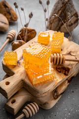 Honey comb. A useful fortified bee product for health and beauty. Vegetarian dietary organic product. Beautiful still life.