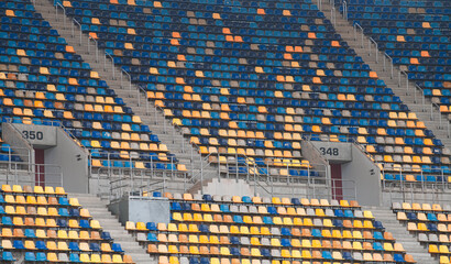 Empty football sport stadium seats during coronavirus pandemic without people