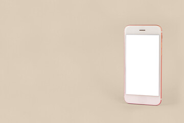 Mobile phone with copy space on pink background, minimal technology concept