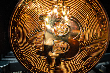 Macro photo of bitcoin cryptocurrency in the dark