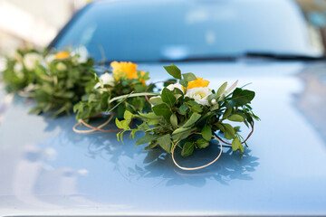 Wedding car.Wedding decoration on wedding car.Luxury wedding car decorated with flowers - selective focus, copy space