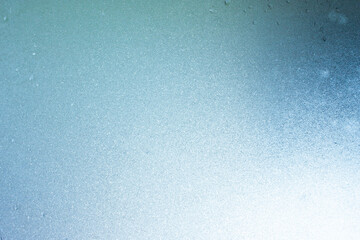 Beautiful natural background or texture of frozen transparent glass on the window in winter, strong...