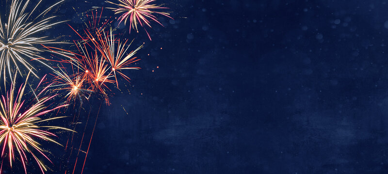 Silvester background banner - firework on rustic dark blue night sky texture