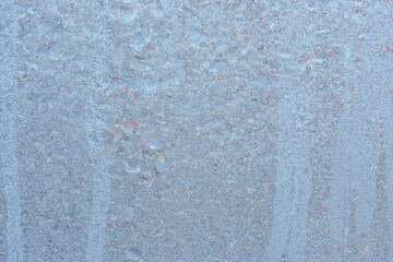 Beautiful natural background or texture of frozen transparent glass on the window in winter, strong cold concept, horizontal image, copy space for your design or text