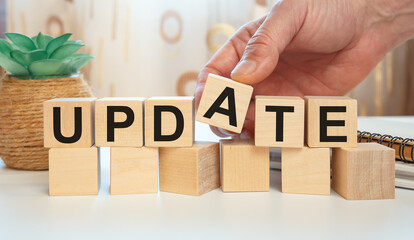 Wooden cubes with the abbreviation UPDATE