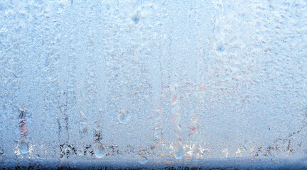 Winter frozen background, beautiful texture of frozen glass in winter, negative air temperature