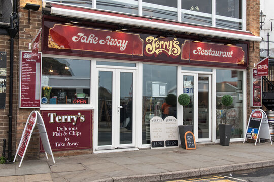 Exterior of Terrys take away fish and chips showing facade, sign, signage and entrance