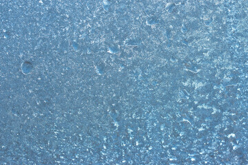 Winter frozen background, beautiful texture of frozen glass in winter, negative air temperature
