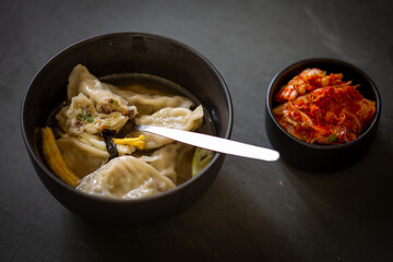 Korean Squid Dumpling Soup which is called MandutGuk