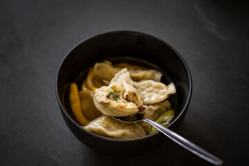 Korean Squid Dumpling Soup which is called MandutGuk