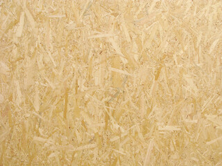 Chipboard, pressed shavings texture, wood background