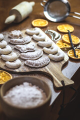 Christmas cookies on wooden table. Sugared traditional vanillekipferl biscuits