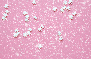 pink christmas background with snowflakes