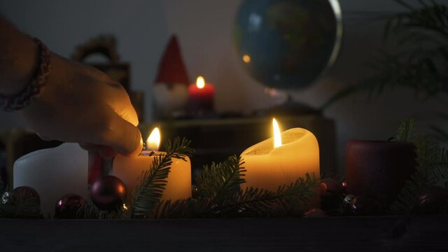 Lighting second candle of advent decoration, 4k, Stock Footage