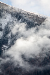 Winter mountains in the clouds. Beautiful mountain landscape