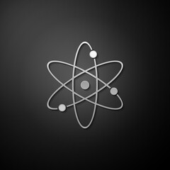 Silver Atom icon isolated on black background. Symbol of science, education, nuclear physics, scientific research. Electrons and protonssign. Long shadow style. Vector.