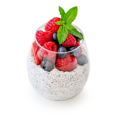 Glass of Chia seed pudding with fruits and fresh  berries isolated on white background. Chia seeds Yogurt.