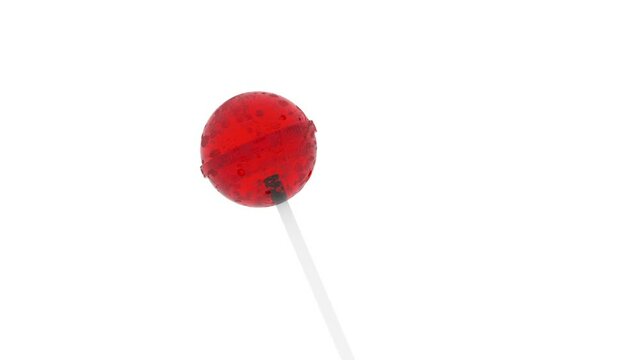 Red caramel on a stick is off-axis and rotates on a white background.