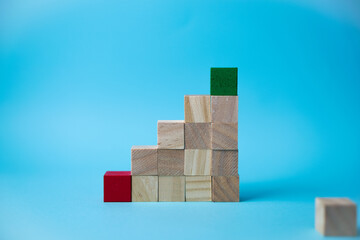 wooden cube stacking as stair step shape, mock up for create symbol or logo, business growth and management concept