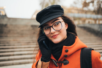 Portrait of young woman talking on the phone