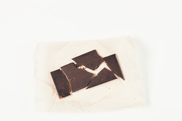 Top view crushed bar of organic dark chocolate