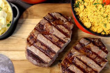 Rib Eye steak grilled in barbecue grill. With excellent accompaniment to meats.
