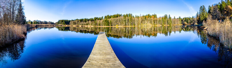 old wooden jetty at a lake