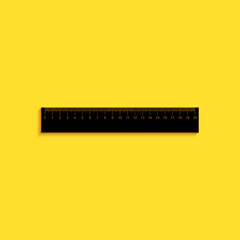 Black Ruler icon isolated on yellow background. Straightedge symbol. Long shadow style. Vector.