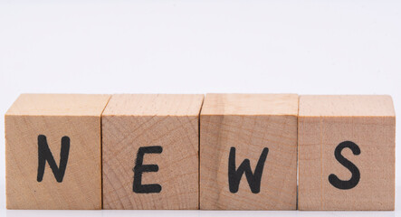 Concept Picture with wooden letters saying the word news.