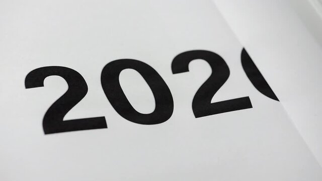 Printing 2021 page on 2020 page, new year change concept
