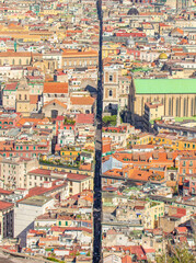 Fototapeta na wymiar Naples, Italy - a straight and narrow street that traverses the old city, Spaccanapoli (Naples splitter) cuts the city for 2 km. Here in particular Spaccanapoli seen from Vomero Hill