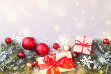Beautiful Christmas or New Year background with place for text on colored background top view with golden bokeh.
