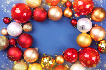 Fototapeta na wymiar Beautiful Christmas or New Year background with place for text on colored background top view with golden bokeh.