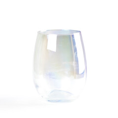 Glass glittering with different colors cup. Close up. Isolated on a white background