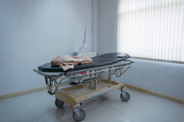 Patient stretcher trolley parked in ward at hospital