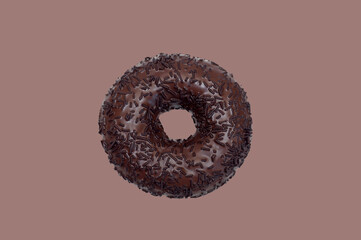 Chocolate Donut with sprinkles on brown background