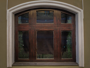 Wooden windows are brown. Combination of architecture and wood window
