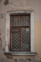 Fototapeta na wymiar Wooden windows are brown. Combination of architecture and wood window