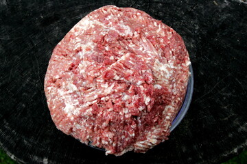 Fresh Raw mince, Minced beef. Close-up of minced meat in a glass bowl, Minced meat mix with fat for homemade sausage, Minced meat background