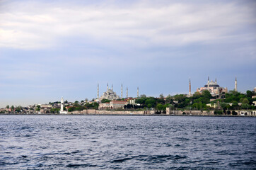 Blue Mosque and Hagia Sophia , are symbols of Istanbul, was shot from boat which was on the sea.