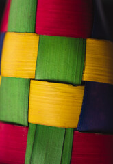 Traditional handcraft colorful indigenous palm Mexican background