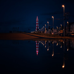 Blackpool Tower reflected in a puddle in the northern British seaside resort