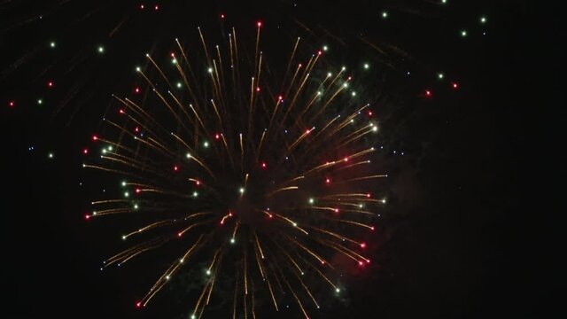 Fireworks Sparkling At The Night Sky.  - low angle static