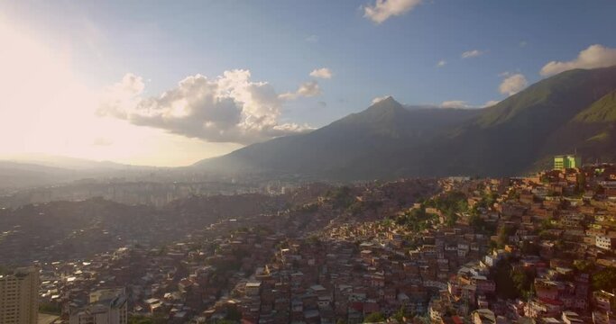 Drone view of Petare slum, in Caracas, Venezuela, during a sunset
