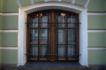 Wooden windows are brown. Combination of architecture and wood window