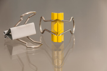 London, United Kingdom, December 05, 2020:
metallic paper clips isolated on white background
