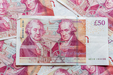 London, United Kingdom, December 05, 2020:  A close-up of British banknotes. Selective focus on the £50 pounds. reverse
