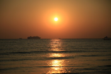 Naklejka na ściany i meble Sunset on the sea