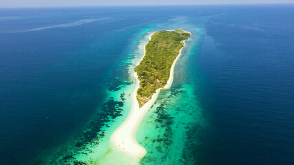 Aerial drone of sandy beach on a tropical island. Little Santa Cruz island. Zamboanga, Mindanao, Philippines.
