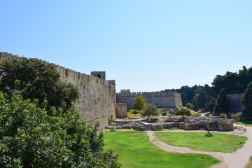 Fototapeta na wymiar A view of the ancient walls of the old town of Rhodes on the Greek island of Rhodes.